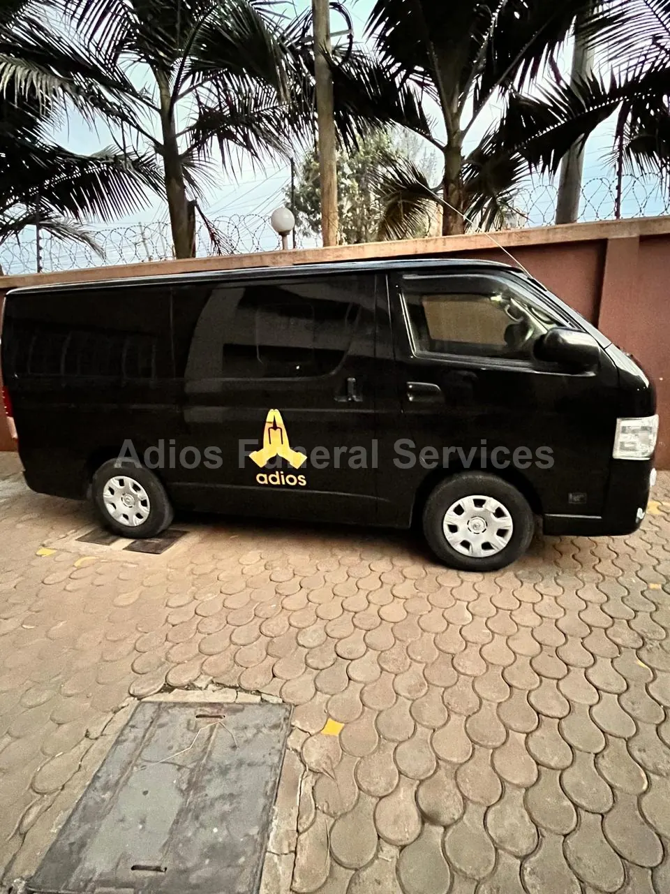 Adios Funeral Services Toyota Hiace hearse van, front view