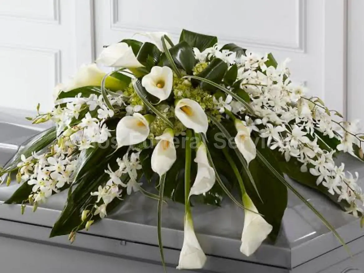Casket spray of white lilies and roses